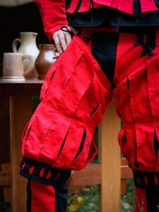 Jambière Imperialis à rayures rouges et noires